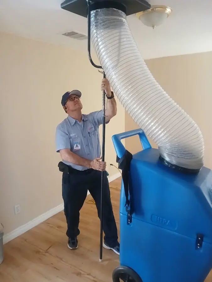 Mini Split Installation technician using HEPA equipment in Valle Vista